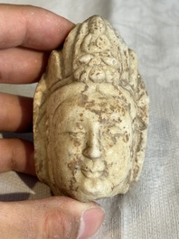 A Chinese marble head of Guanyin, Tang