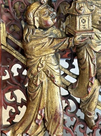 Two pairs of Chinese carved, lacquered and gilt-decorated wooden panels with figural design, 19th C.