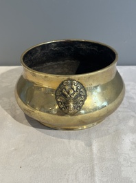 A Chinese bronze elephant-head-handled censer, Xuande mark, Kangxi/Qianlong