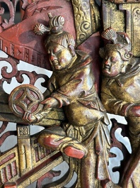 Two pairs of Chinese carved, lacquered and gilt-decorated wooden panels with figural design, 19th C.