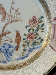 A pair of Chinese famille rose 'magpie and peony' plates with bianco-sopra-bianco rims, Yongzheng