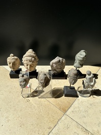 A collection of 9 Gandhara grey schist and stucco fragments of Buddha and divinities, 1/2nd C.