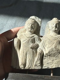 A collection of six Gandhara grey schist fragments with Bodhisattva, divinities and figures, 2/4th C.