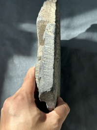 A Gandhara grey schist fragment of a seated Buddha with his disciple and a fragment with five figures, 1st/3rd C.