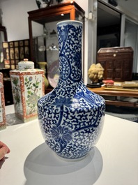 A Chinese blue and white bottle-shaped 'lotus scroll' vase and a pair of square famille verte flasks and covers, 19th C.