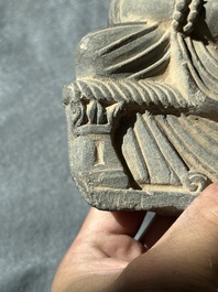 Four Gandhara grey schist fragments with Buddha and Bodhisattva, 1st/3rd C.