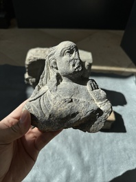 Six Gandhara grey schist fragments with divinities and floral design, 1/4th C.