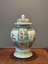 A Chinese famille verte covered vase and a bottle vase, 19th C.