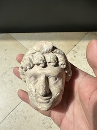 A collection of 9 Gandhara grey schist and stucco fragments of Buddha and divinities, 1/2nd C.