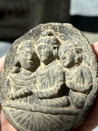 Six Gandhara grey schist fragments with divinities and floral design, 1/4th C.