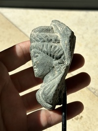 A collection of 9 Gandhara grey schist and stucco fragments of Buddha and divinities, 1/2nd C.