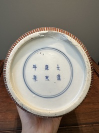 A Chinese famille verte covered vase and a bottle vase, 19th C.