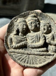 Six Gandhara grey schist fragments with divinities and floral design, 1/4th C.