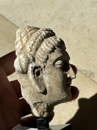 A collection of 9 Gandhara grey schist and stucco fragments of Buddha and divinities, 1/2nd C.