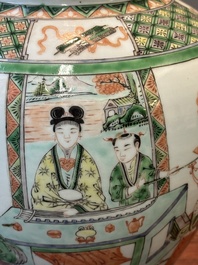 A Chinese famille verte covered vase and a bottle vase, 19th C.