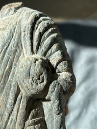 Two Gandhara grey schist torsos of Buddha and a tiger sculpture, 1st/3rd C.