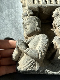 A Gandhara grey schist fragment of a seated Buddha with his disciple and a fragment with five figures, 1st/3rd C.