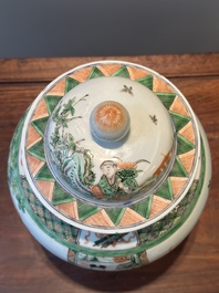 A Chinese famille verte covered vase and a bottle vase, 19th C.