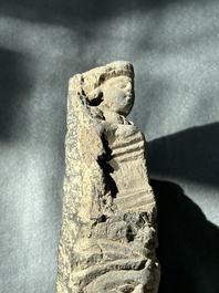 A Gandhara grey schist fragment of a seated Buddha with his disciple and a fragment with five figures, 1st/3rd C.