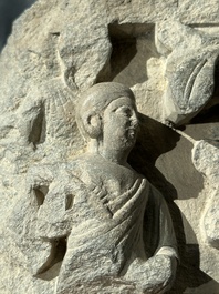 A Gandhara grey schist fragment of a seated Buddha with his disciple and a fragment with five figures, 1st/3rd C.