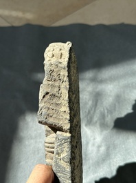 A Gandhara grey schist fragment of a seated Buddha with his disciple and a fragment with five figures, 1st/3rd C.