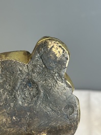 An extremely rare Chinese gilt bronze figure of Guandi, Ming