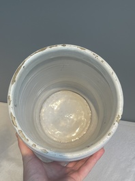 A large Dutch Delft blue and white albarello, inscribed 'Corenten', 18th C.