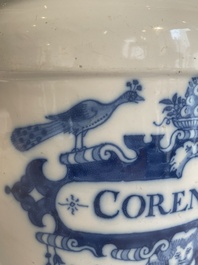 A large Dutch Delft blue and white albarello, inscribed 'Corenten', 18th C.