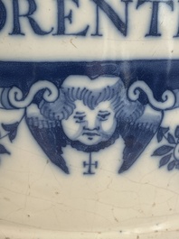 A large Dutch Delft blue and white albarello, inscribed 'Corenten', 18th C.