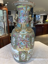 A large Chinese Canton famille rose vase and cover with narrative design, 19th C.