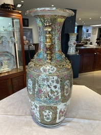 A large Chinese Canton famille rose vase and cover with narrative design, 19th C.