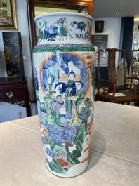 A pair of Chinese famille verte rouleau vases with narrative design, 19th C.