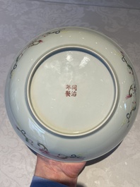 A Chinese yellow-ground famille rose 'magpie and plum tree' plate, Tongzhi mark and of the period