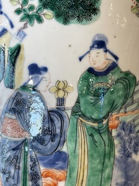 A pair of Chinese famille verte rouleau vases with narrative design, 19th C.