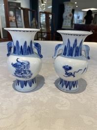 A pair of Chinese blue and white vases, a pair of sancai Buddhist lions, a famille rose ewer and a teapot, 19th C.
