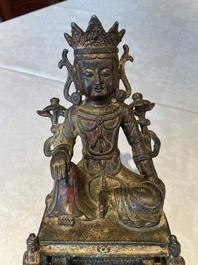A Chinese bronze Bodhisattva on stand, Yongle mark, dated 1422
