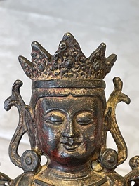 A Chinese bronze Bodhisattva on stand, Yongle mark, dated 1422