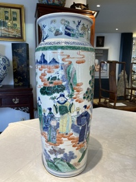 A pair of Chinese famille verte rouleau vases with narrative design, 19th C.