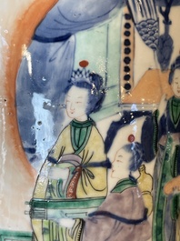 A pair of Chinese famille verte rouleau vases with narrative design, 19th C.