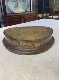 A large Sino-Tibetan gilt bronze Buddha on wooden stand, Ming