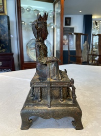 A Chinese bronze Bodhisattva on stand, Yongle mark, dated 1422