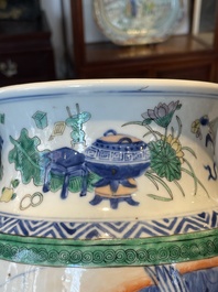 A pair of Chinese famille verte rouleau vases with narrative design, 19th C.