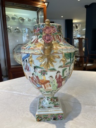 A rare pair of Chinese Canton famille rose export urns, 19th C.