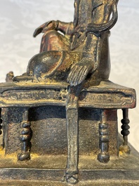 A Chinese bronze Bodhisattva on stand, Yongle mark, dated 1422