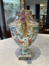 A rare pair of Chinese Canton famille rose export urns, 19th C.