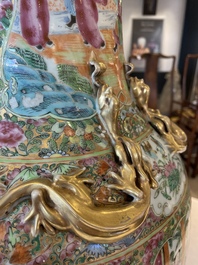A large Chinese Canton famille rose vase and cover with narrative design, 19th C.