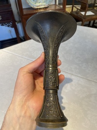 A fine and rare Chinese bronze vase with floral design in the style of Hu Wenming 胡文明, 'gu 觚', Ming