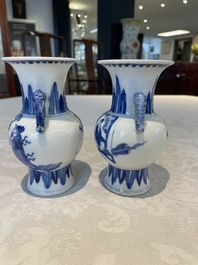 A pair of Chinese blue and white vases, a pair of sancai Buddhist lions, a famille rose ewer and a teapot, 19th C.