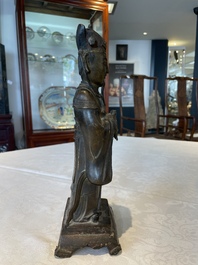 A Chinese bronze figure of an official, Ming