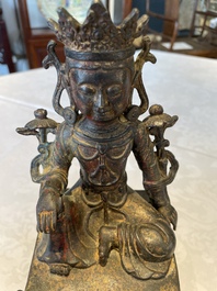A Chinese bronze Bodhisattva on stand, Yongle mark, dated 1422